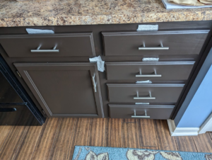 drawers with paper towel while paint dries