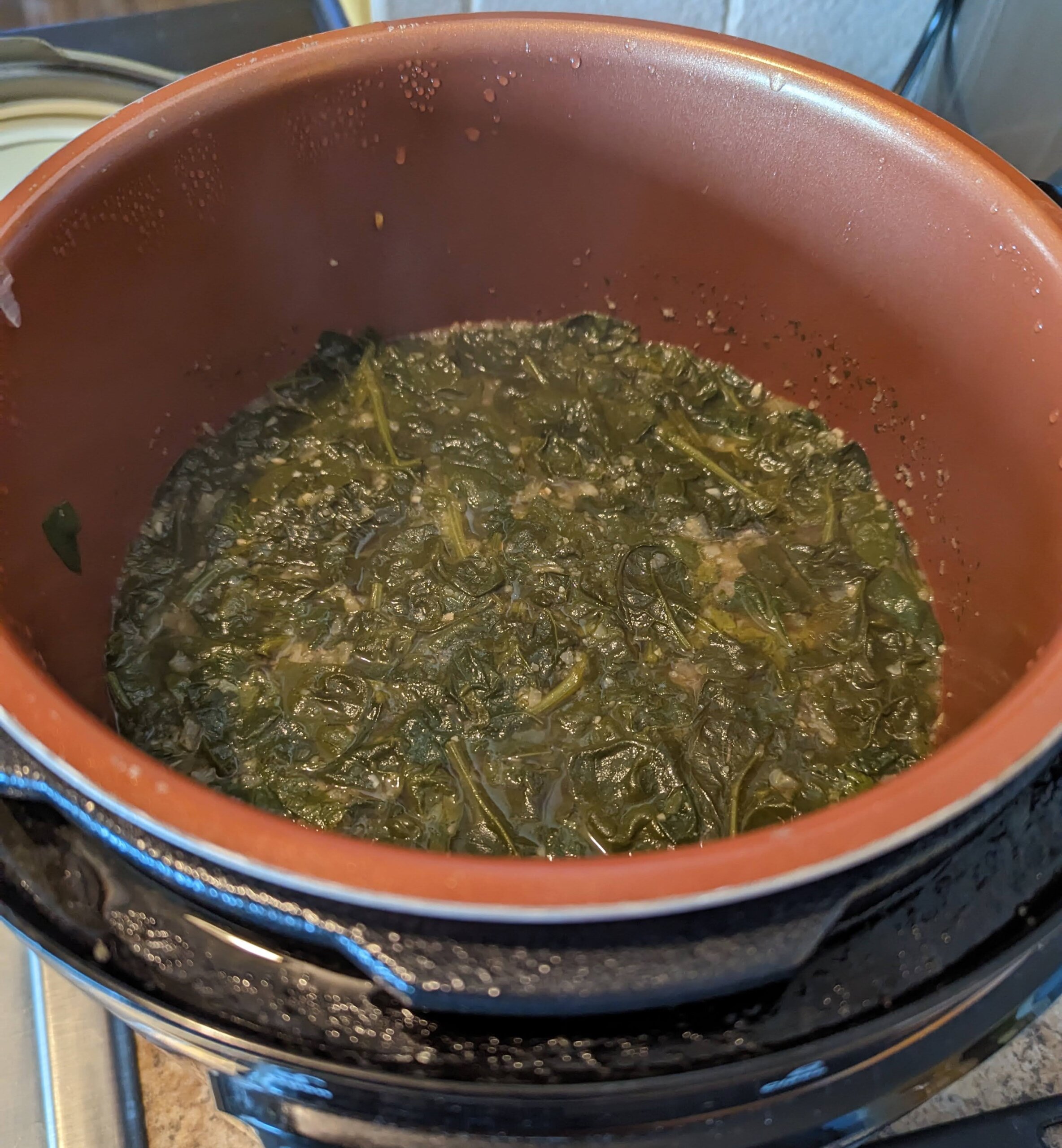 Spinach collects on top until stirred in.